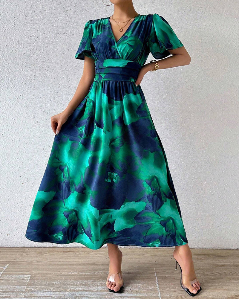 Elegantes Swingkleid mit V-Ausschnitt und Blumendruck