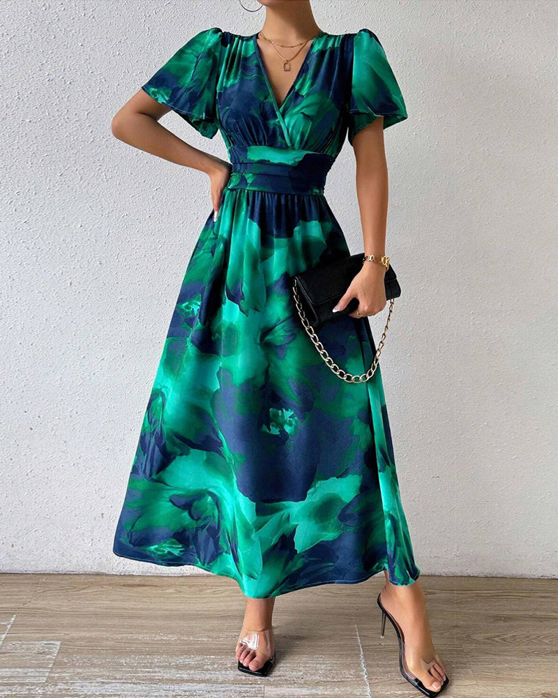 Elegantes Swingkleid mit V-Ausschnitt und Blumendruck