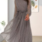 Elegantes Kleid mit Tupfenmuster